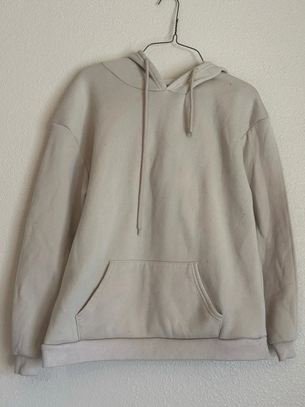 Women’s Cream Crewneck Hoodie with Orange 'Love Never Fails' Graphic